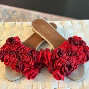 Very beautiful sandals with red satin roses.